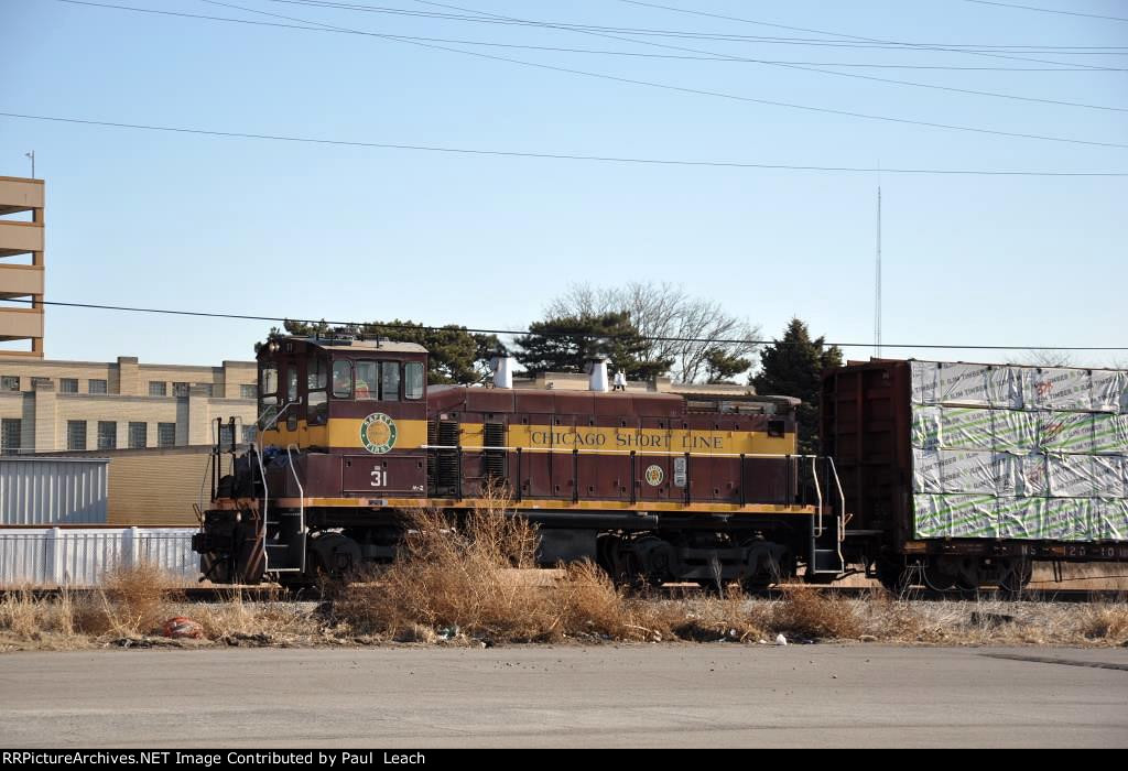 Local ambles west behind the station